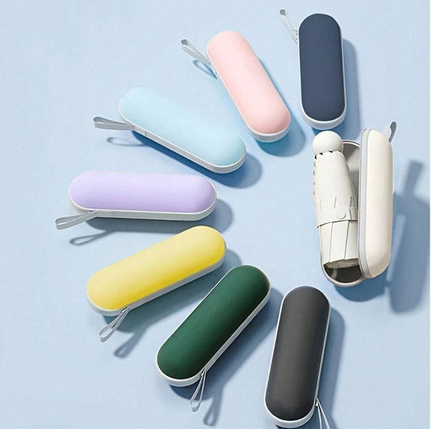 Assorted colour capsule umbrella cases - pocket size portable